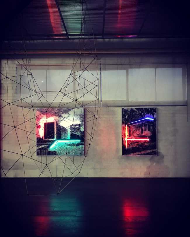 Artwork by Tom Adair